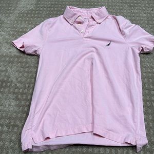 Pink polo collared short sleeve shirt.